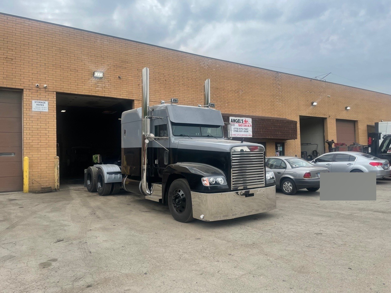 Custom black Freightliner at Angels Truck Care